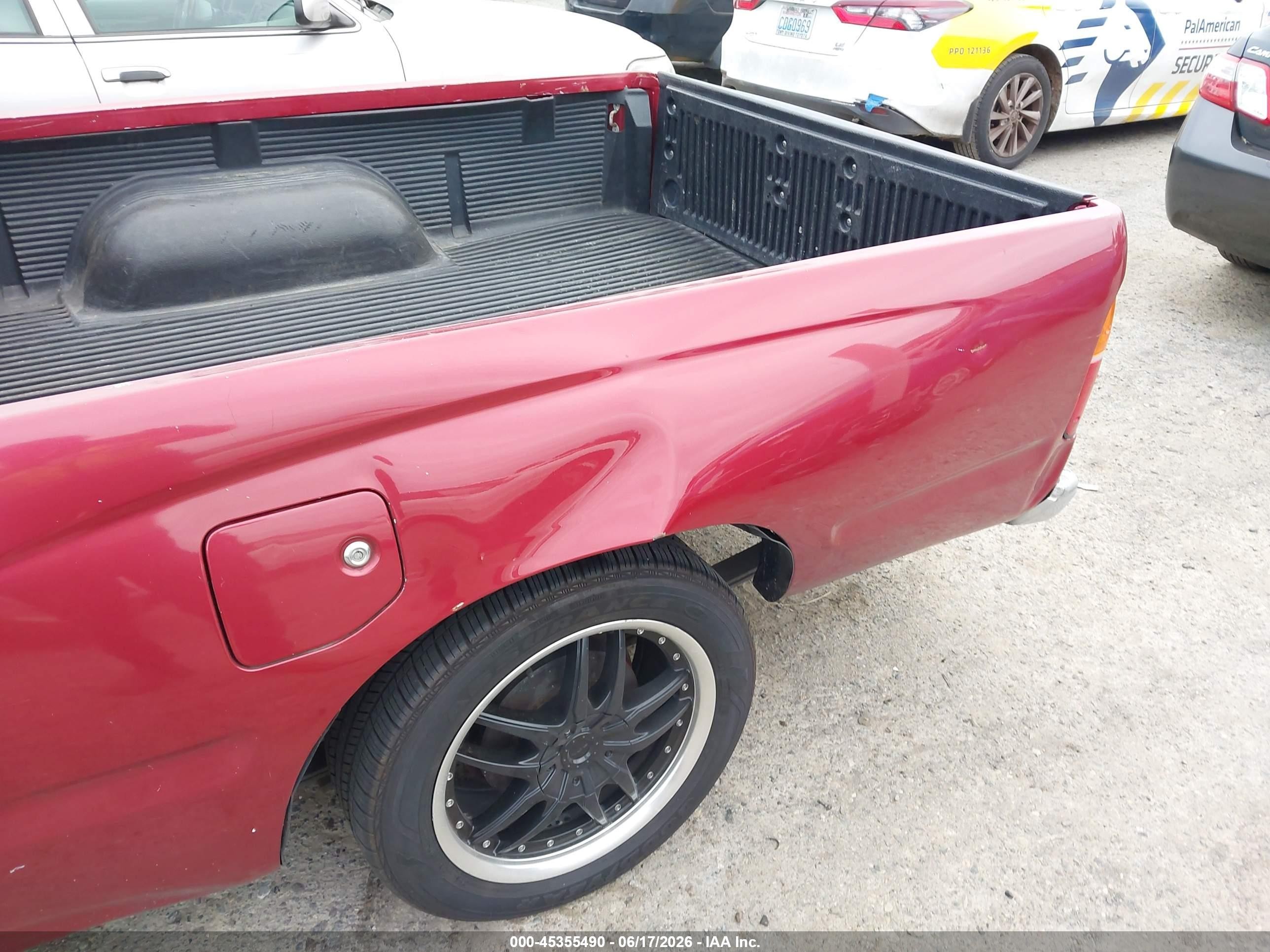 1999 Toyota Tacoma   Red vin: 4TAVL52N7XZ453875
