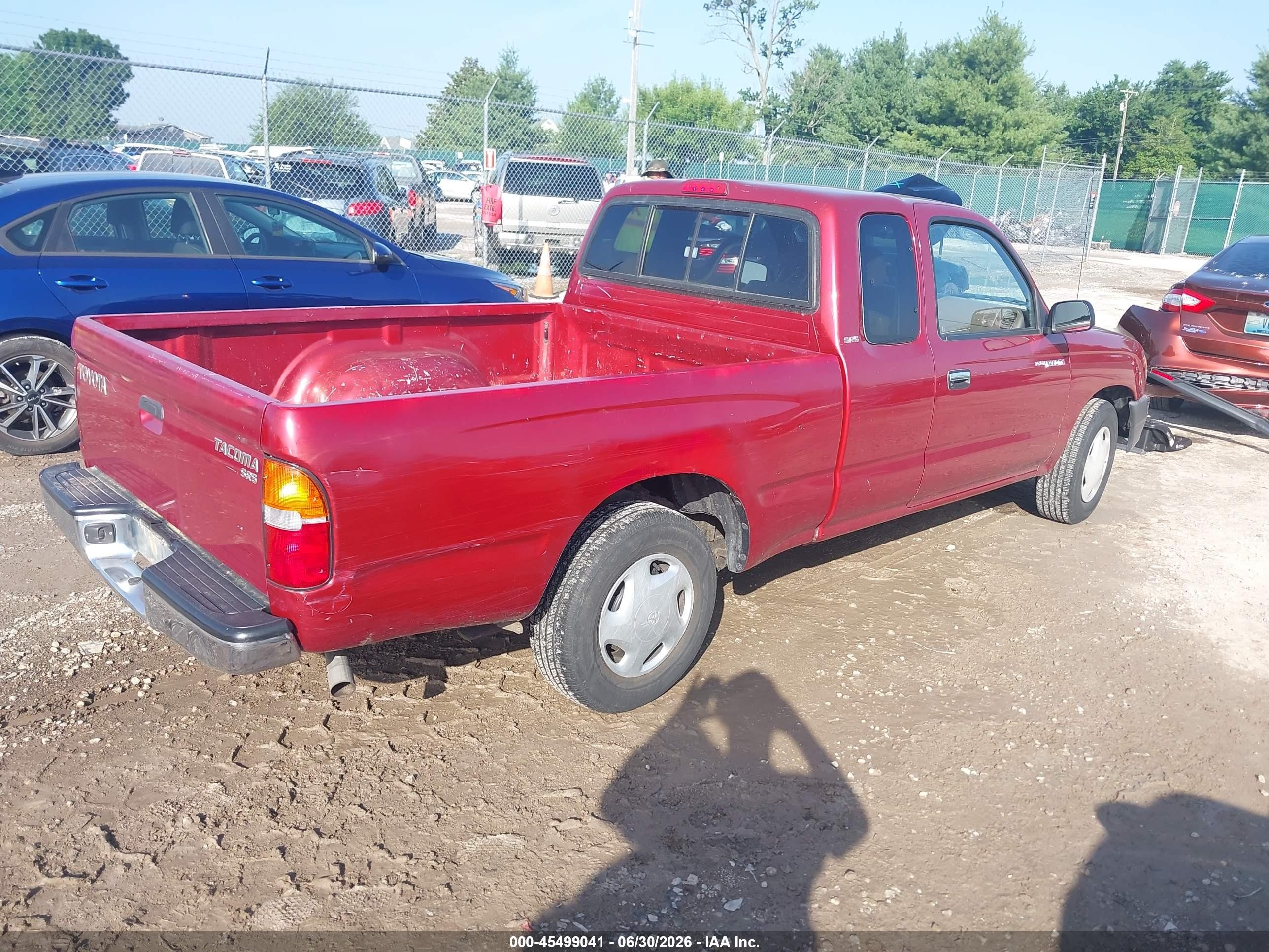 1999 Toyota Tacoma   Red vin: 4TAVL52NXXZ488099