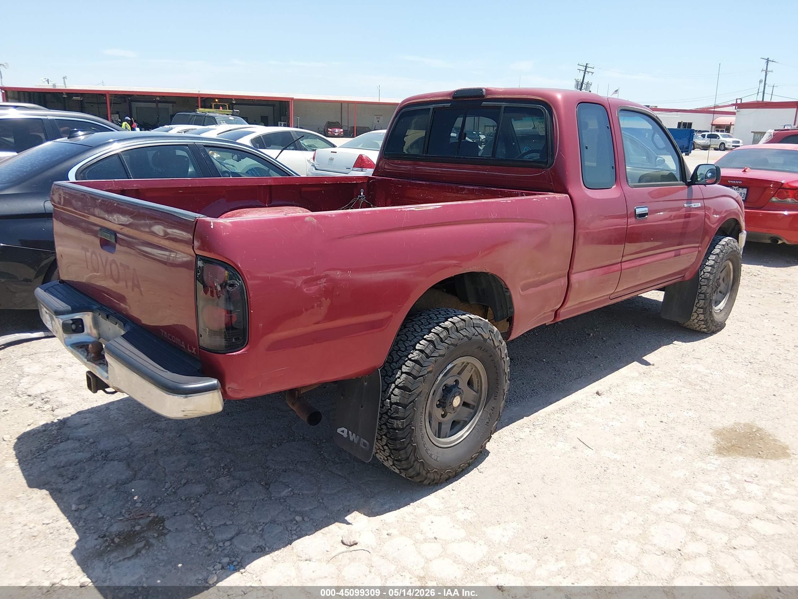 1997 Toyota Tacoma   Red vin: 4TAWM72N1VZ271910