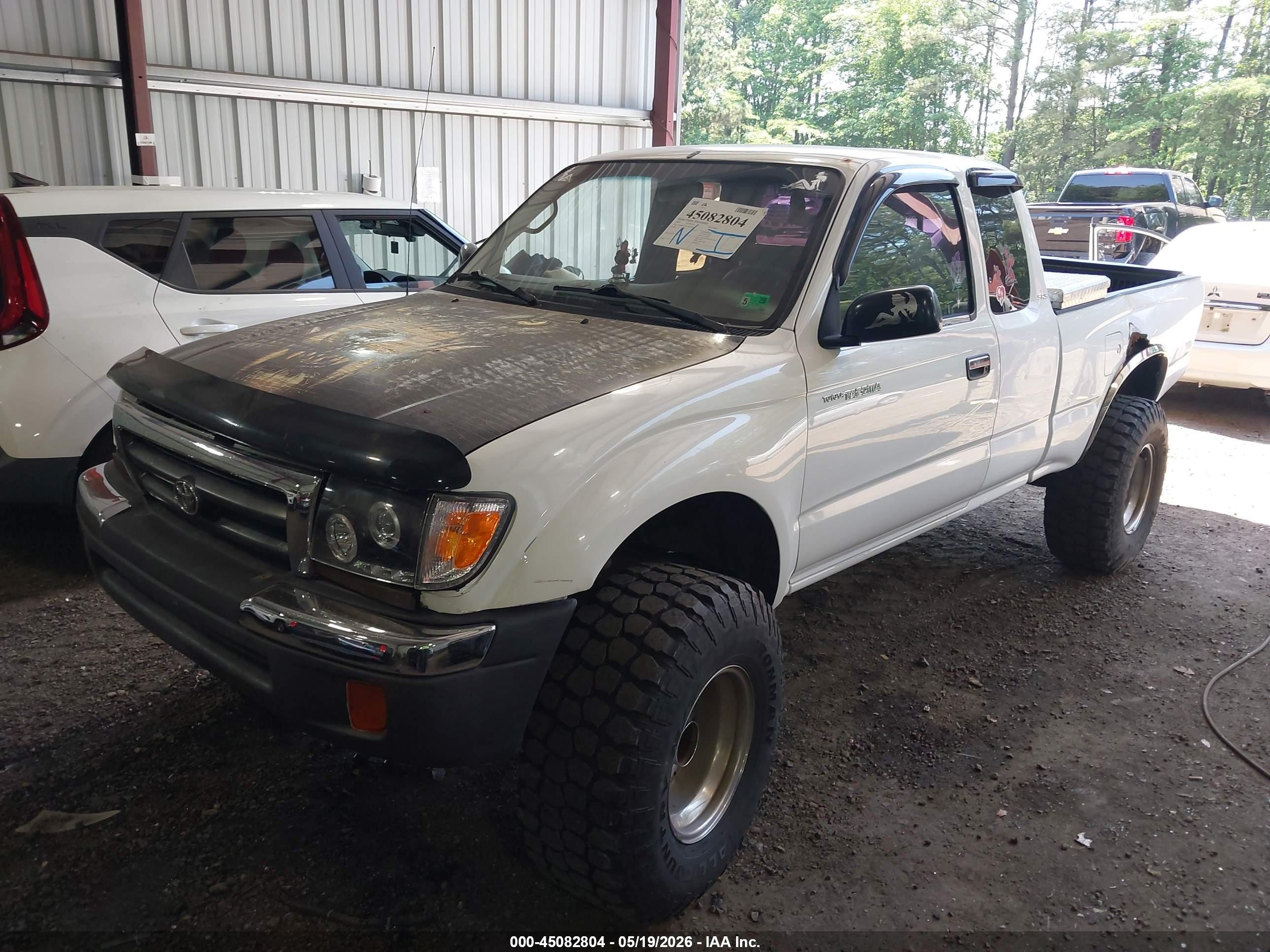 1999 Toyota Tacoma   Белый vin: 4TAWM72N1XZ464075