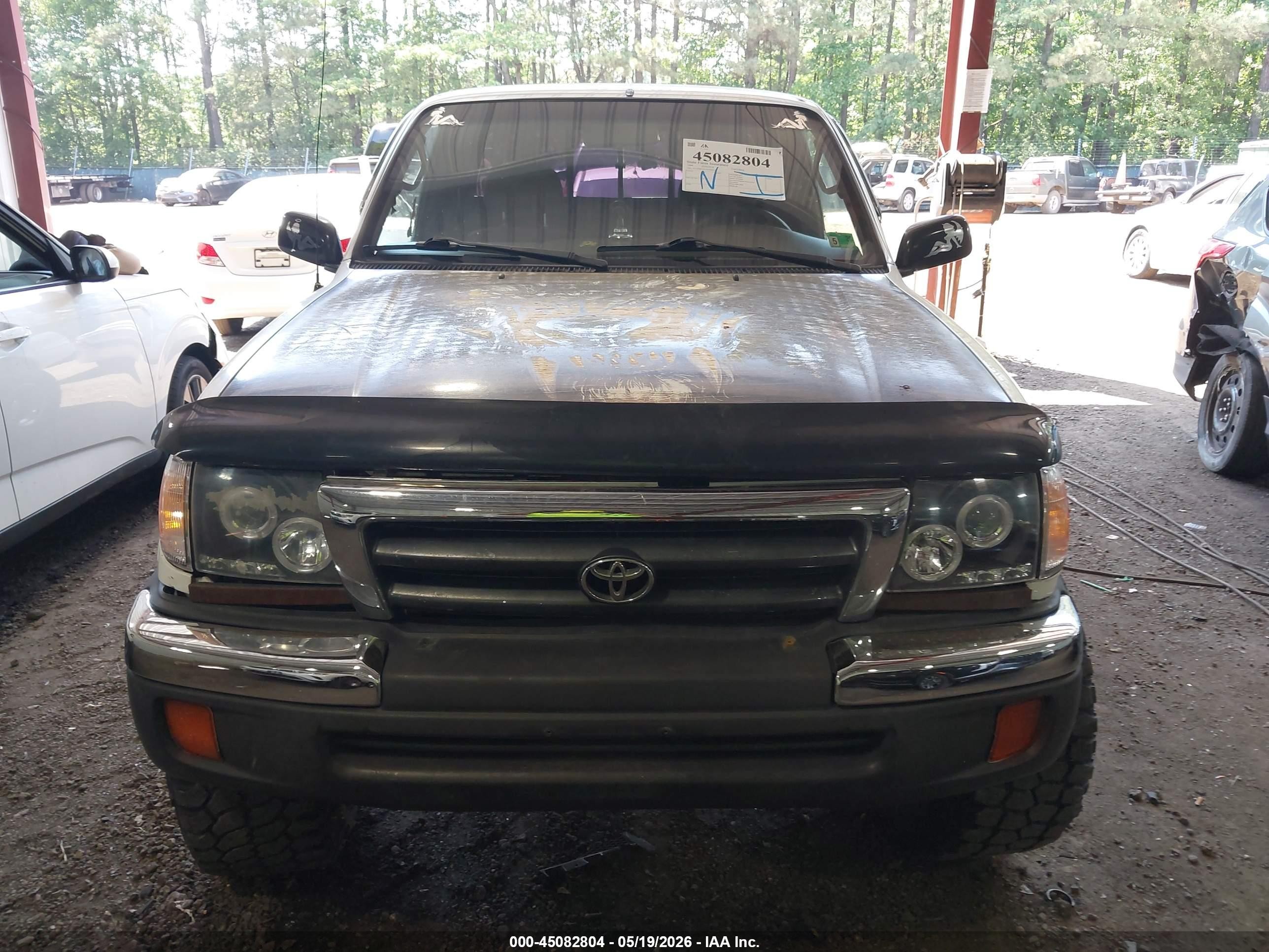 1999 Toyota Tacoma   Белый vin: 4TAWM72N1XZ464075