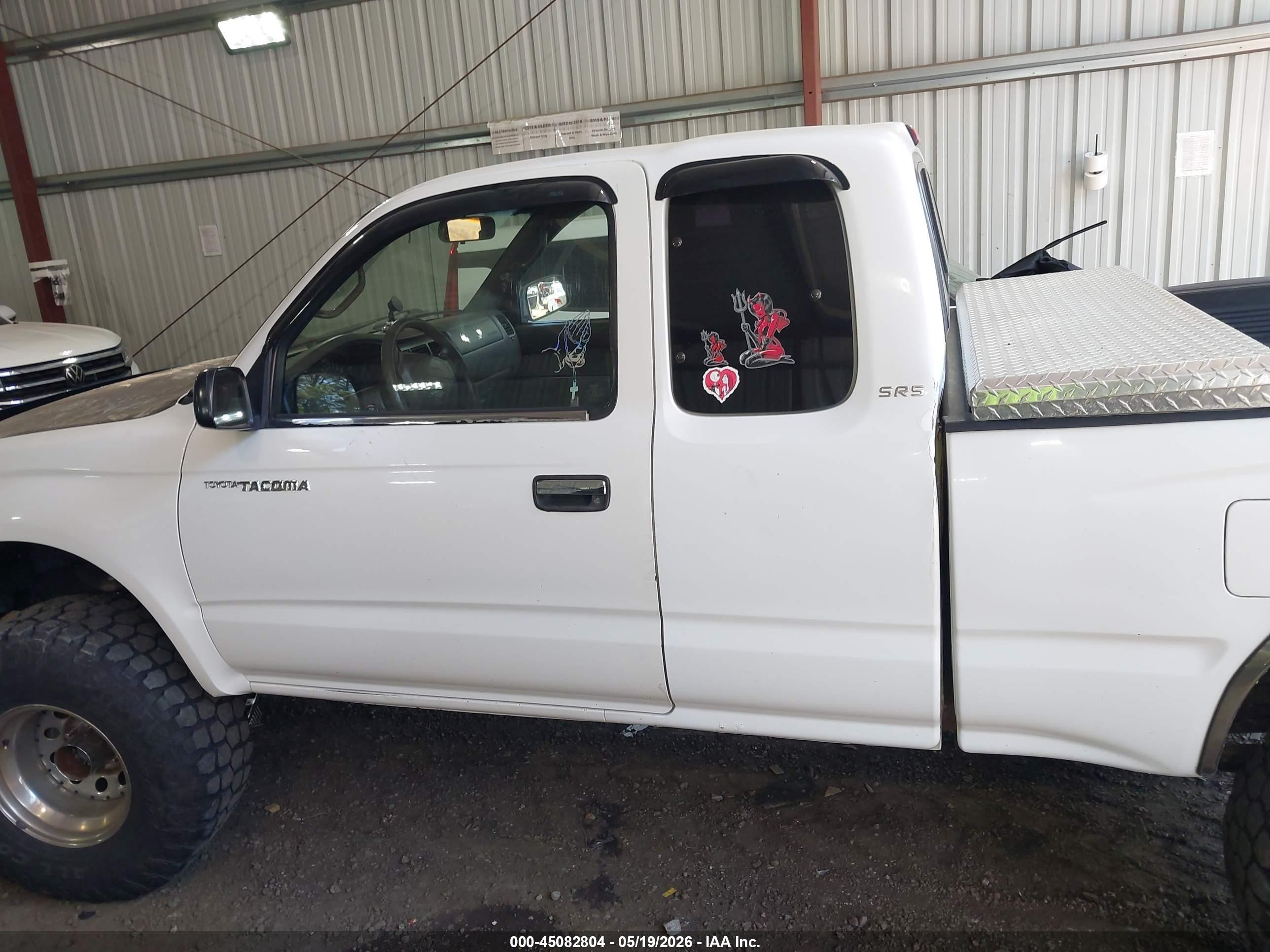 1999 Toyota Tacoma   Белый vin: 4TAWM72N1XZ464075