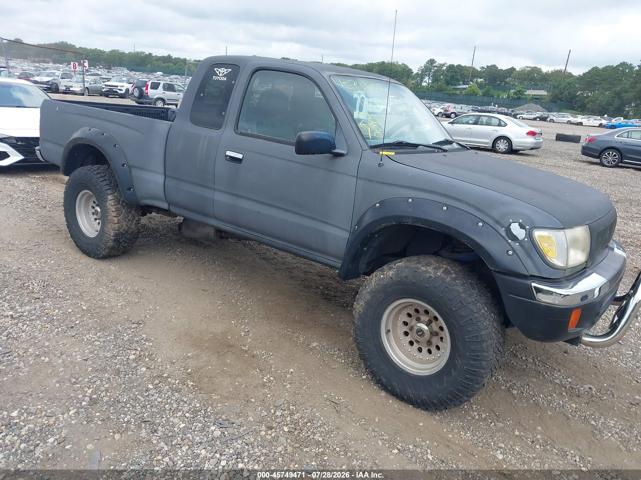 1999 Toyota Tacoma   Black vin: 4TAWM72N4XZ502480