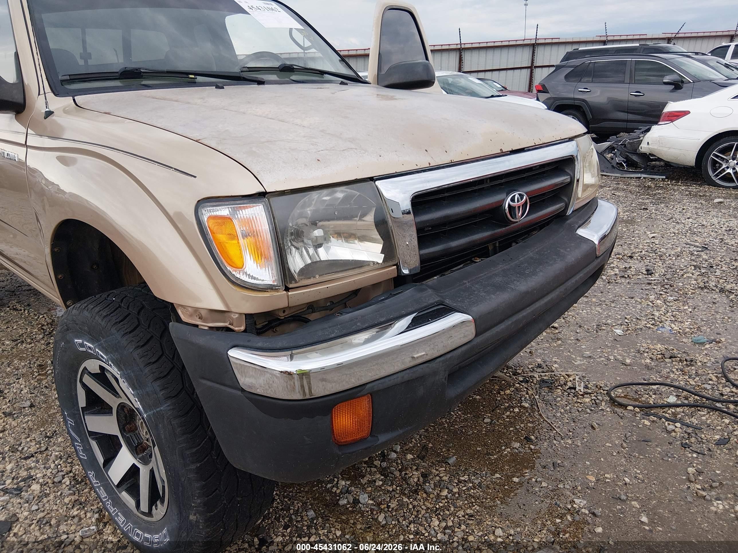 2000 Toyota Tacoma   Желто-коричневый vin: 4TAWM72N7YZ666209