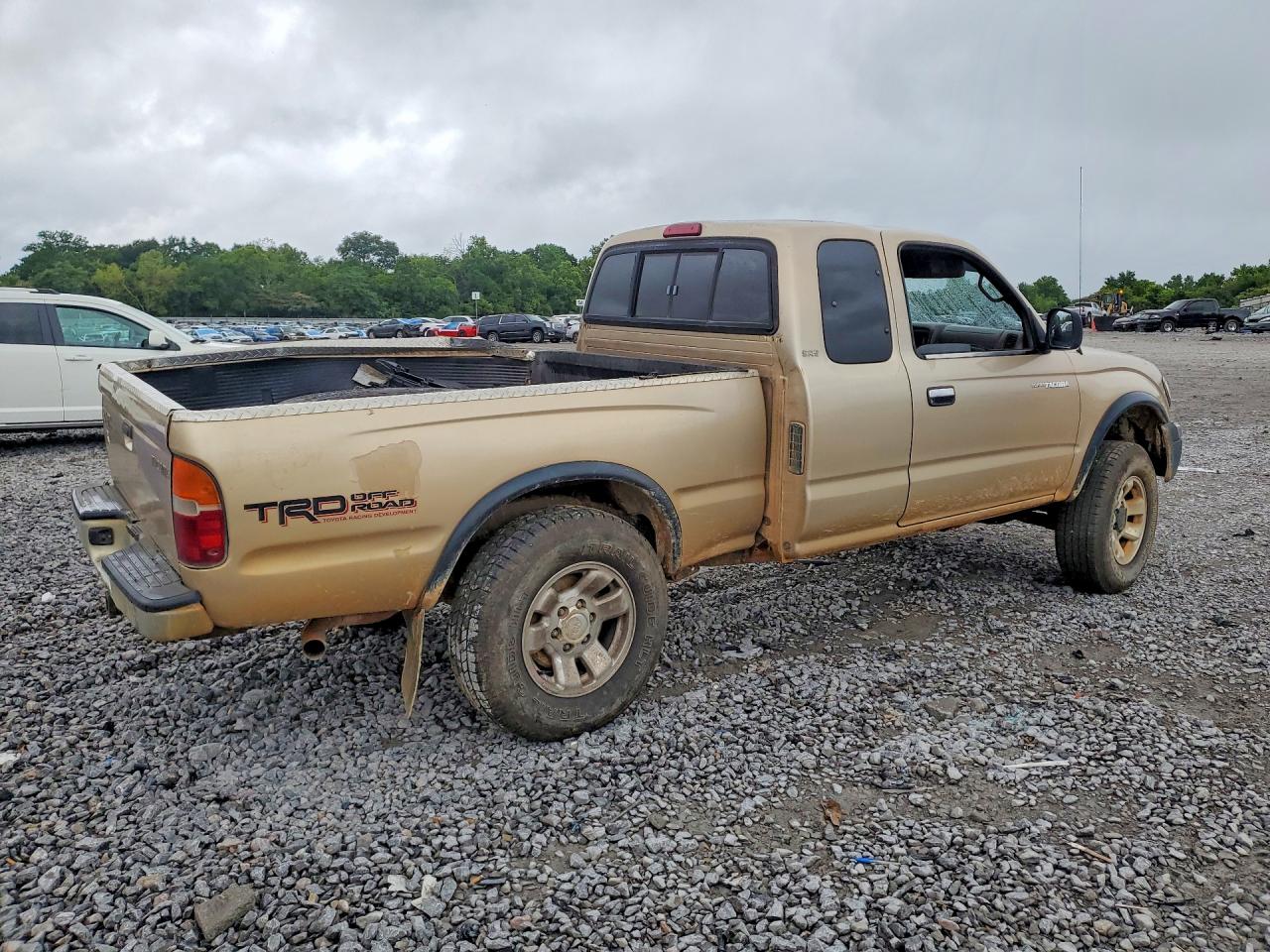 2000 Toyota Tacoma Xtracab Gold vin: 4TAWN72N7YZ665686