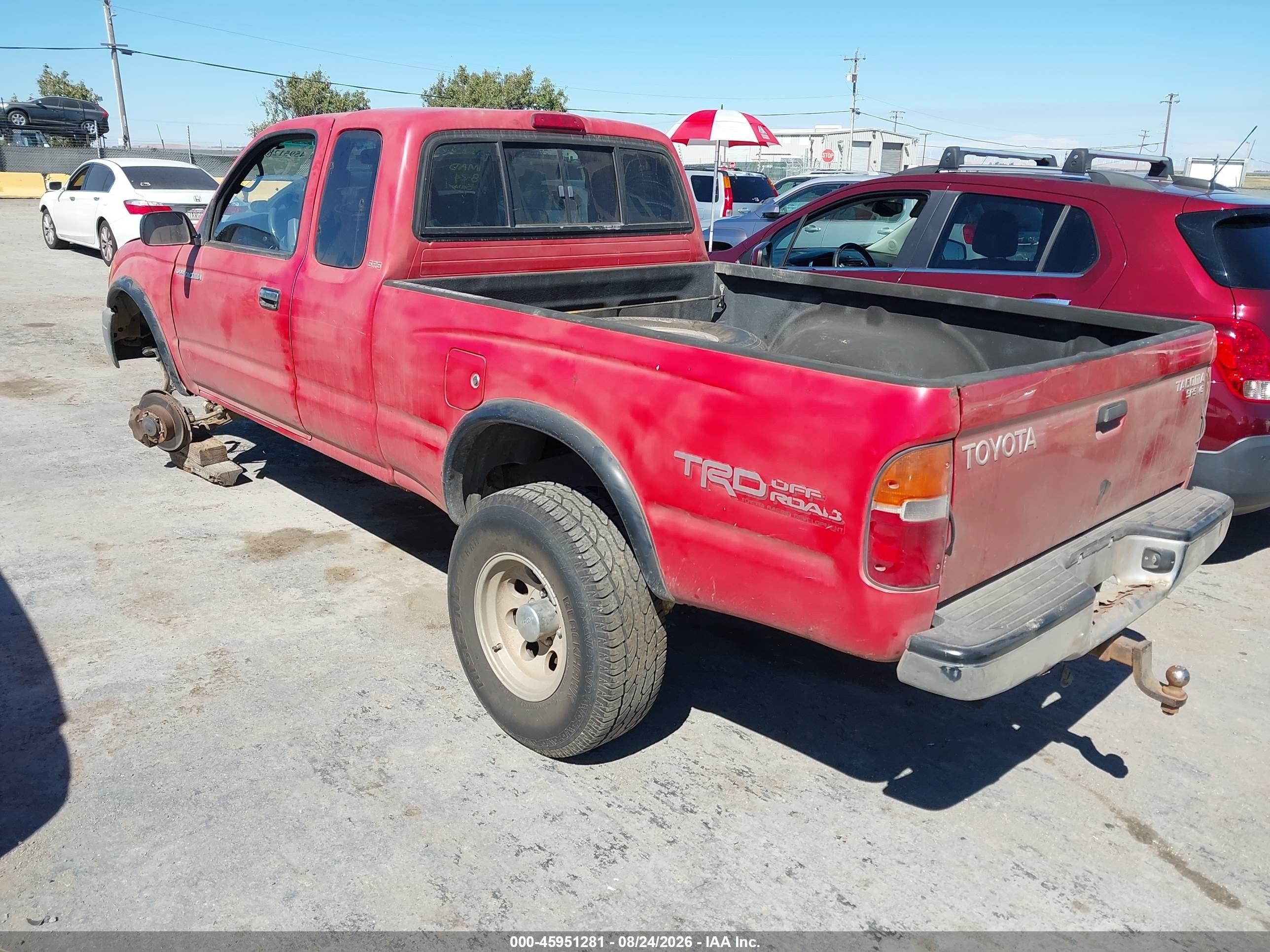 1999 Toyota Tacoma   Red vin: 4TAWN72N8XZ569547