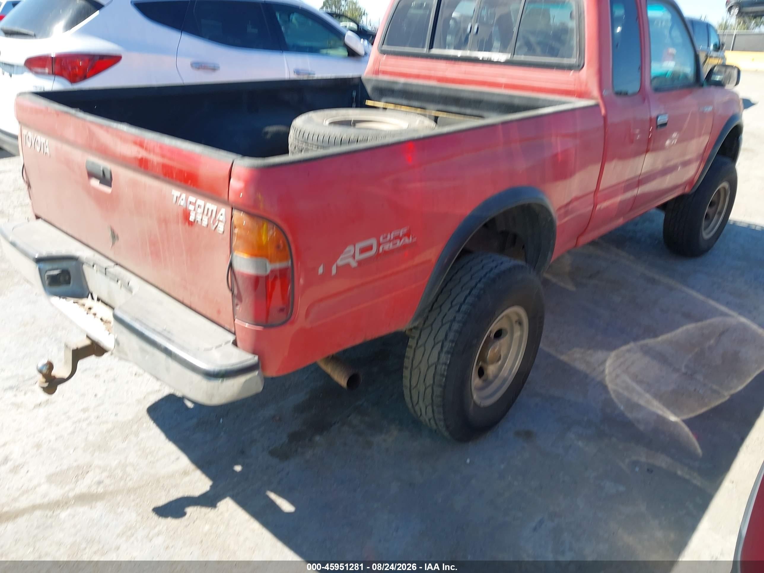 1999 Toyota Tacoma   Red vin: 4TAWN72N8XZ569547