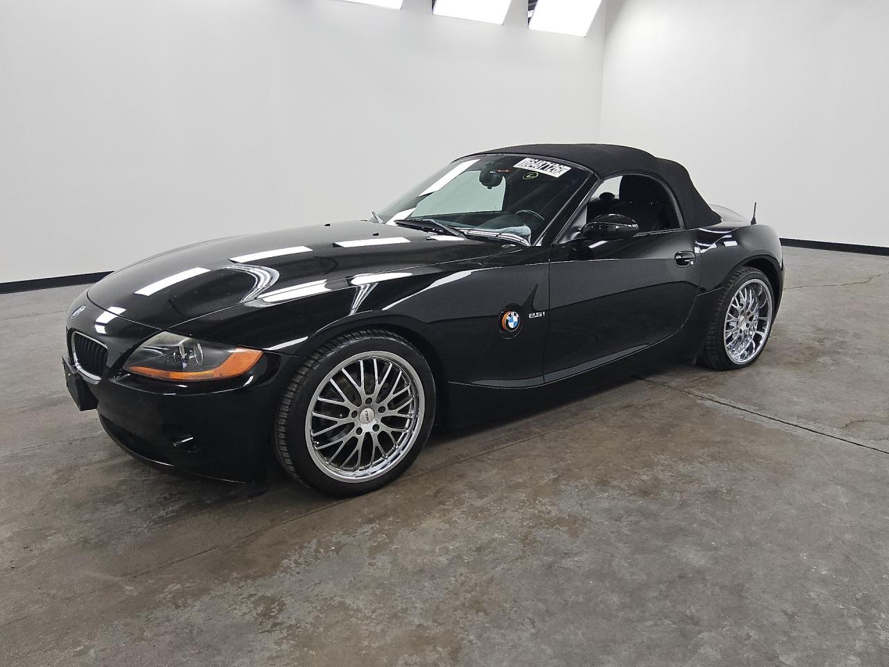 2003 Bmw Z4 2.5 Black vin: 4USBT33483LR63659 Damage: Left Front Wheel, Aftermarket, Acceptable