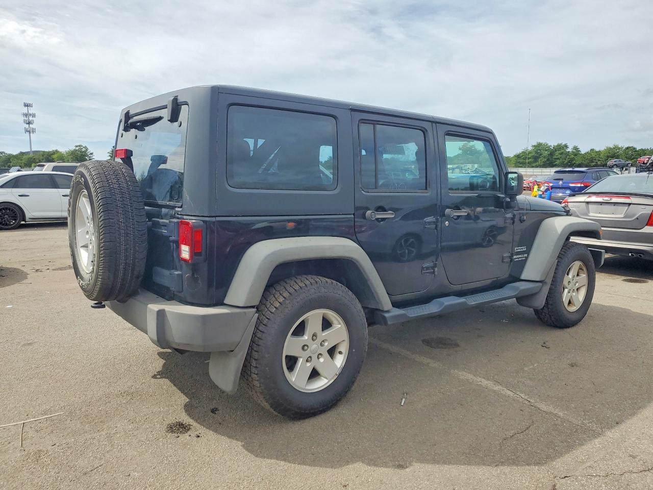 2012 Jeep Wrangler Unlimited Sport Black vin: 1C4BJWDG9CL142513