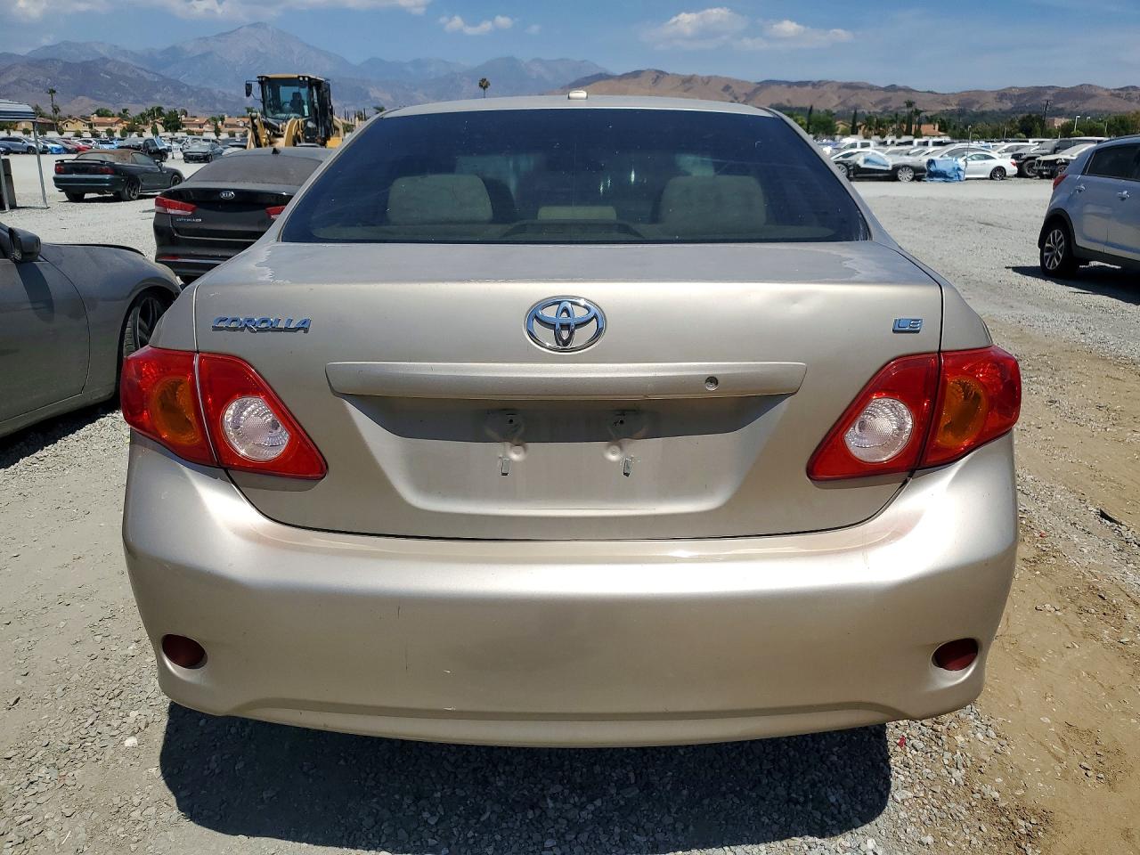 2010 Toyota Corolla Le Gold vin: 2T1BU4EE8AC354896
