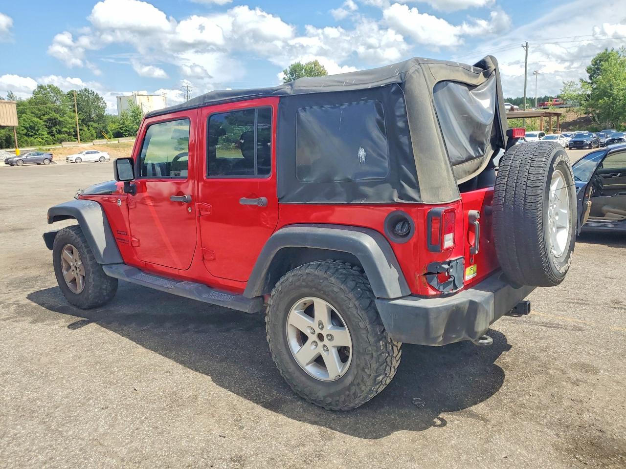 2015 Jeep Wrangler Unlimited Sport Red vin: 1C4BJWDGXFL620877