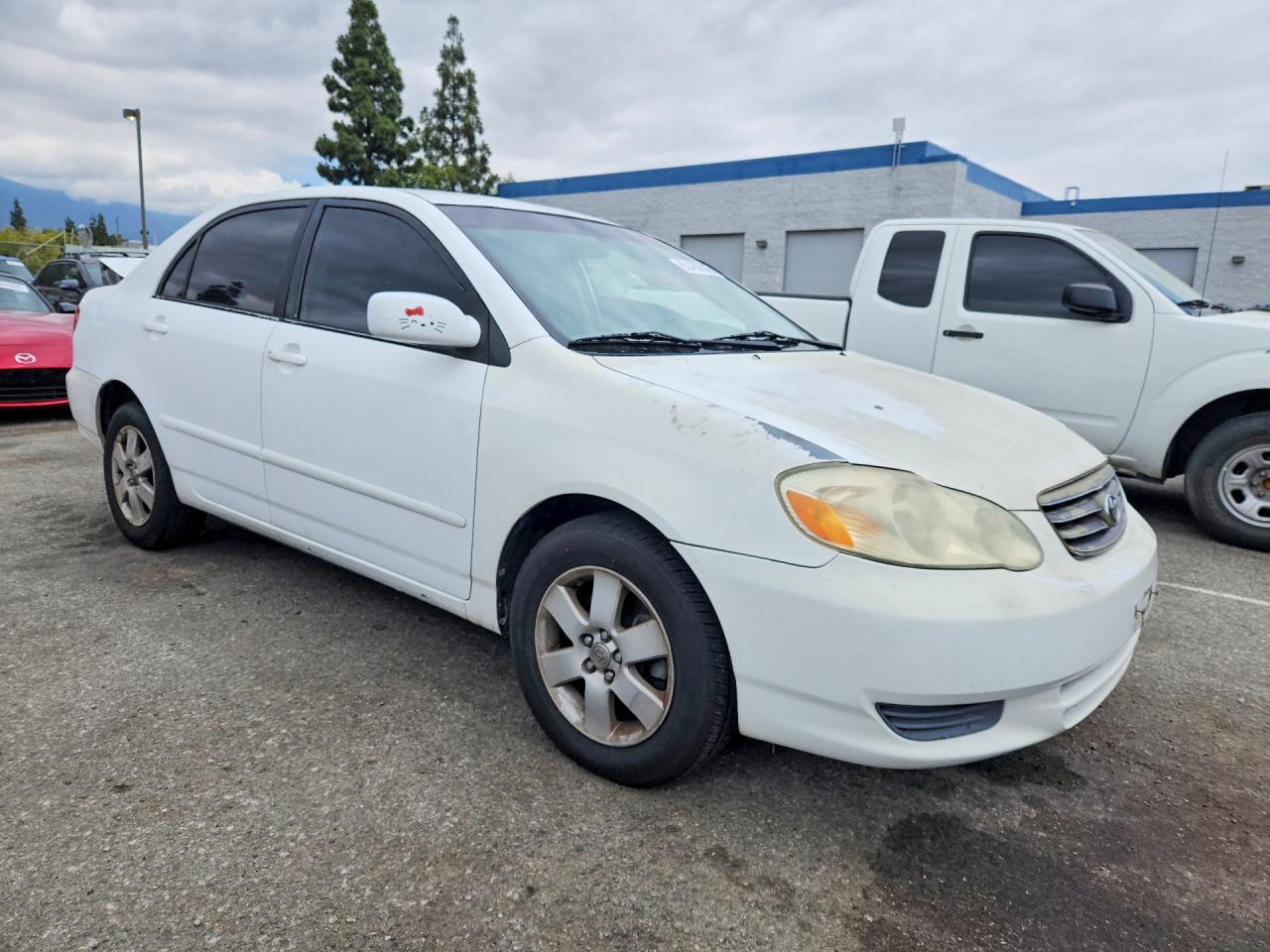 2003 Toyota Corolla Le White vin: 1NXBR32EX3Z026977