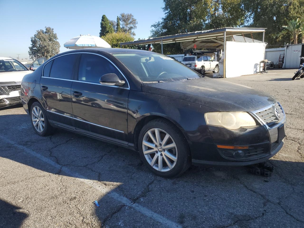 2010 Volkswagen Passat Komfort Black vin: WVWJM7AN4AE141914