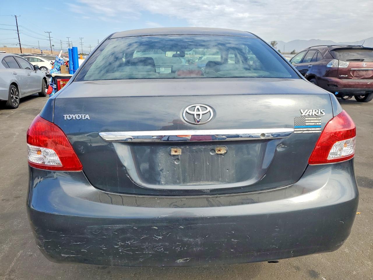 2010 Toyota Yaris Base Угольный vin: JTDBT4K32A4069118