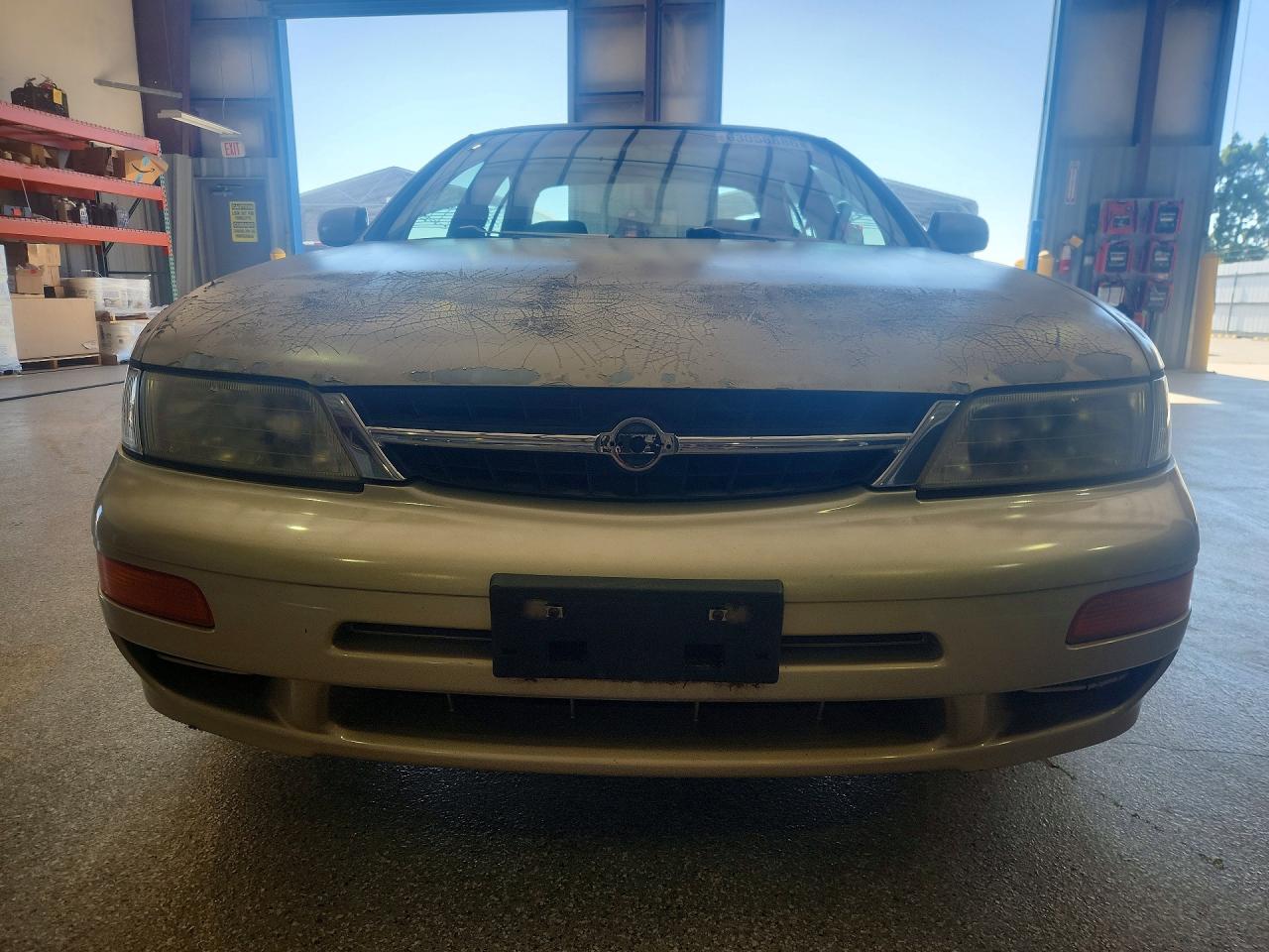 1998 Nissan Maxima Gxe Tan vin: JN1CA21D3WM916456