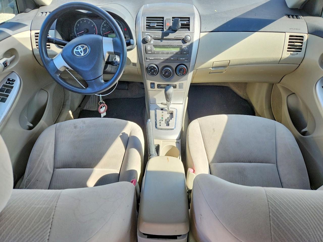 2011 Toyota Corolla Le Tan vin: JTDBU4EE4B9167372