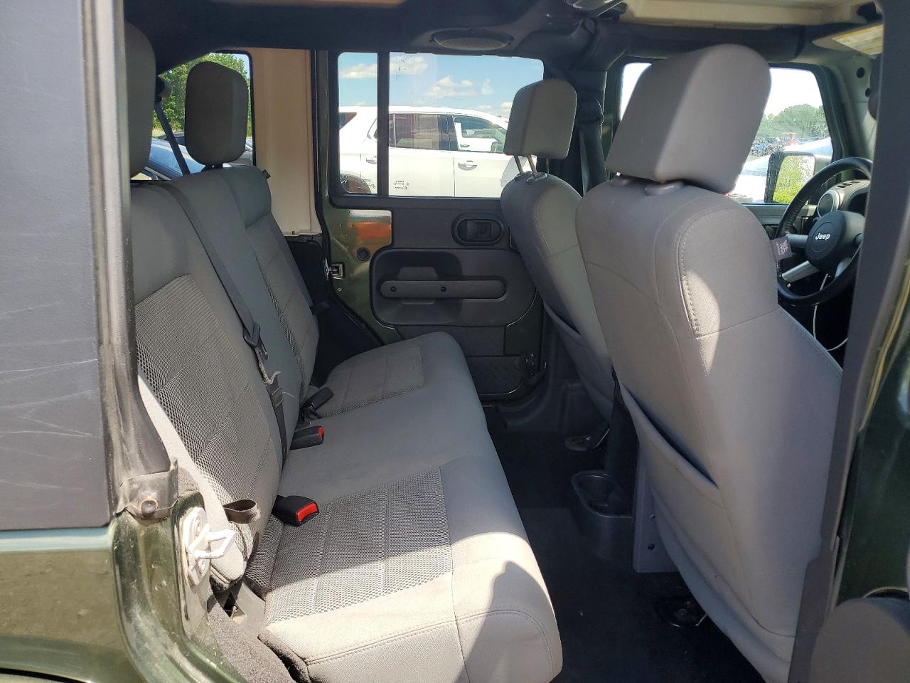 2009 Jeep Wrangler Unlimited Sahara Green vin: 1J4GA59159L733168