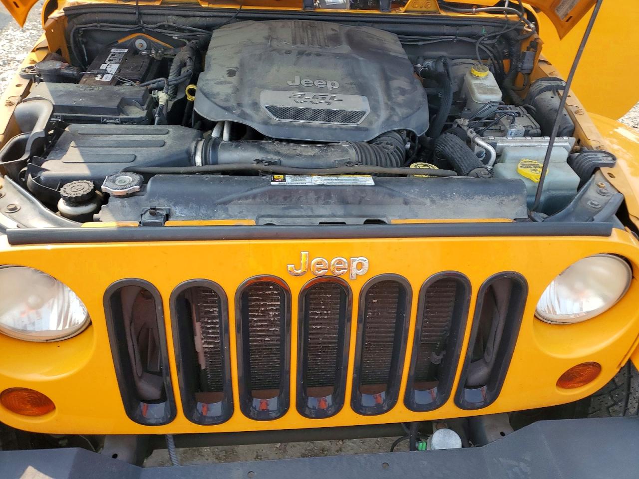 2012 Jeep Wrangler Sahara Orange vin: 1C4AJWBG2CL152864