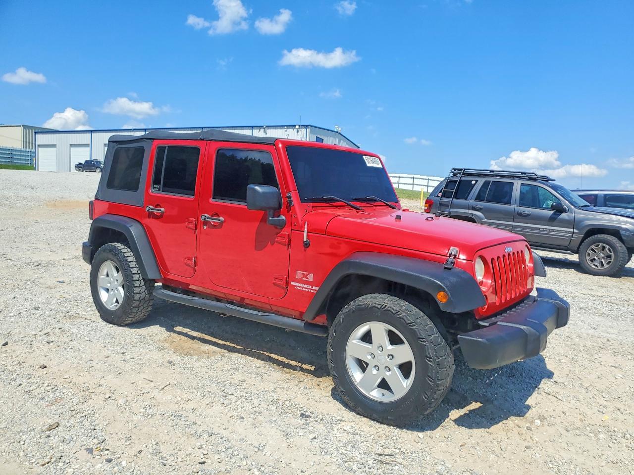 2009 Jeep Wrangler Unlimited X Red vin: 1J4GA39149L767302