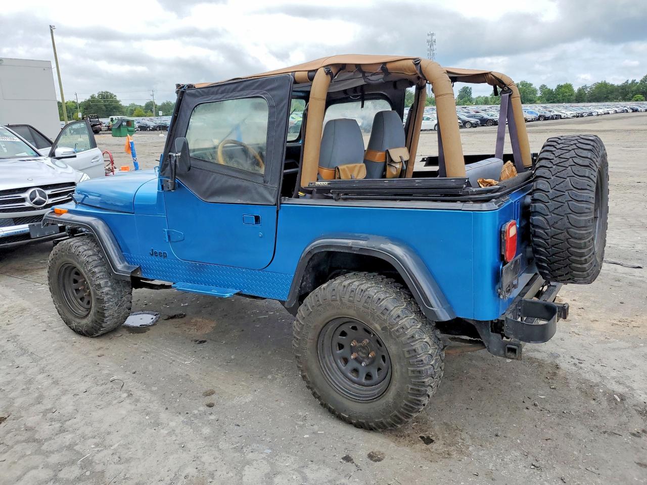 1994 Jeep Wrangler / Yj Sahara Blue vin: 1J4FY49S2RP421926