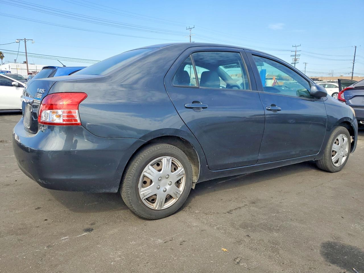 2010 Toyota Yaris Base Угольный vin: JTDBT4K32A4069118