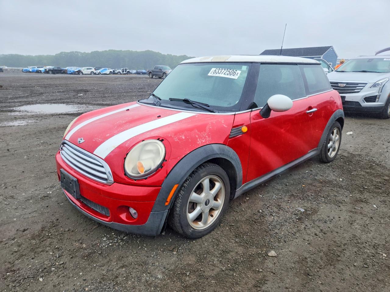 2009 Mini Cooper Red vin: WMWMF33529TW76970