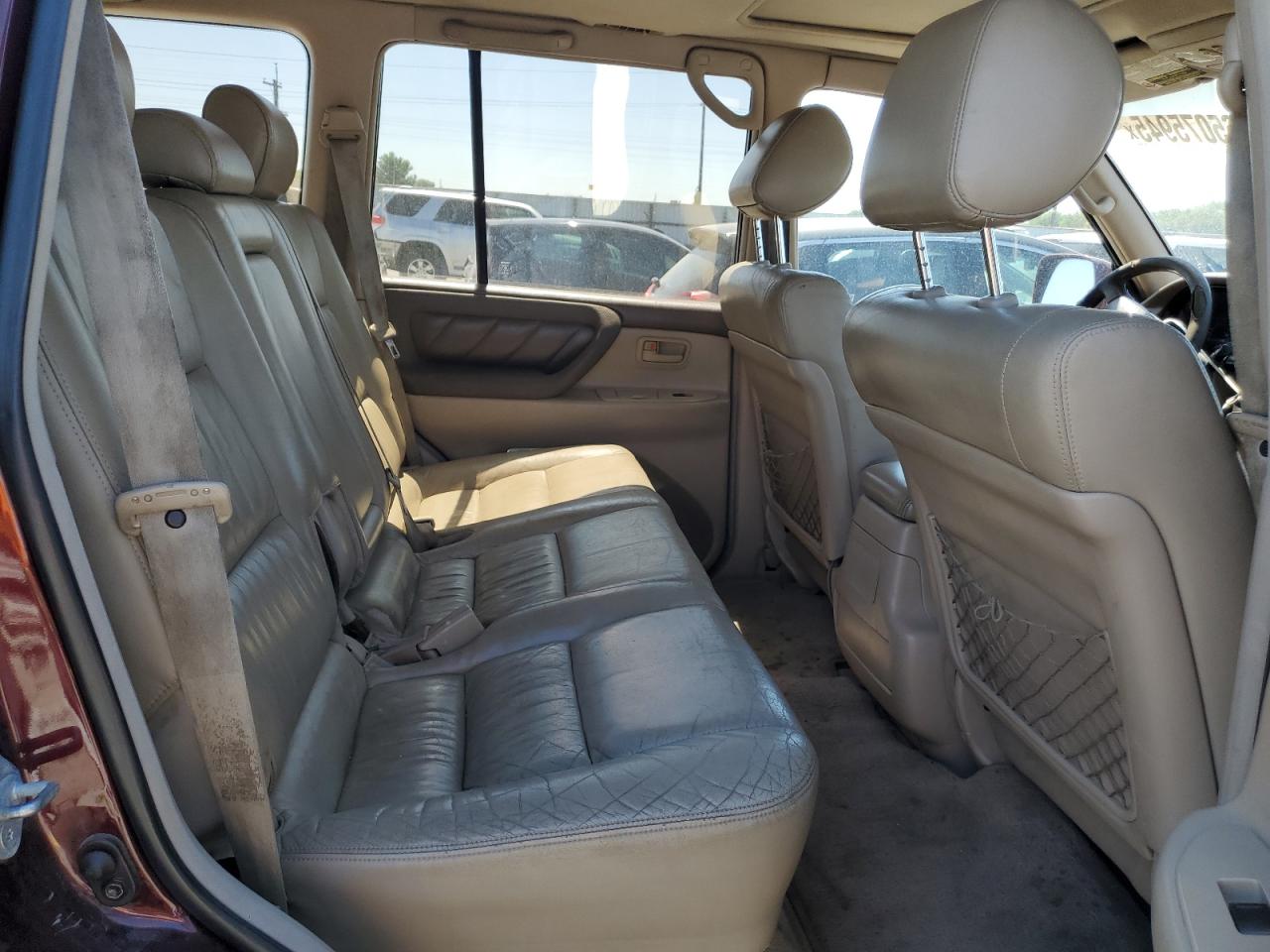 1999 Toyota Land Cruiser    Burgundy vin: JT3HT05JXX0048695