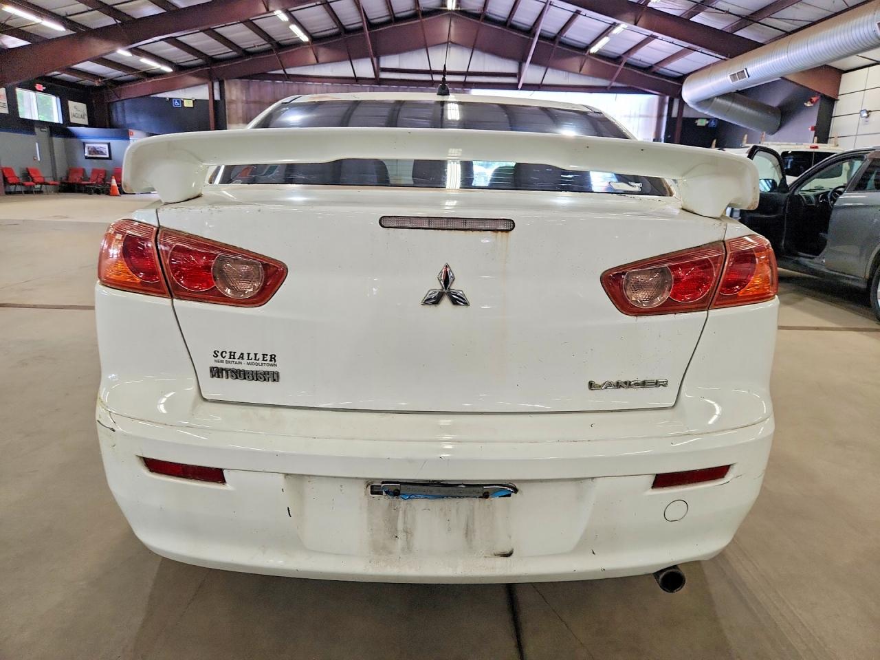 2009 Mitsubishi Lancer De White vin: JA3AU16U39U002385