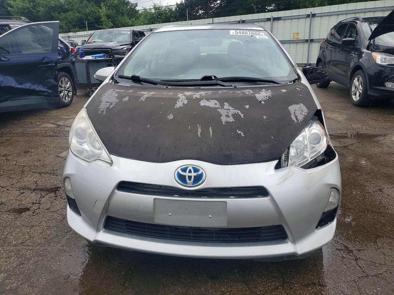 2012 Toyota Prius C Three Серебряный vin: JTDKDTB37C1018872