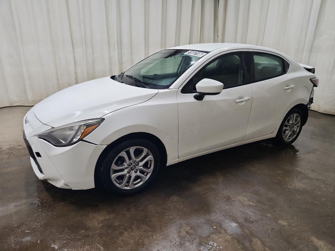 2018 Toyota Yaris Ia Base White vin: 3MYDLBYVXJY311299 Damage: Left Front Fender, Multiple Scratches Heavy, 2