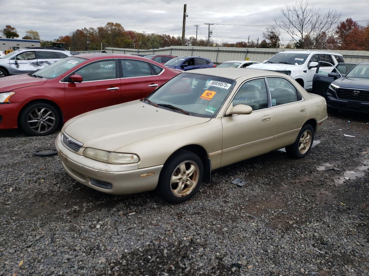1996 Mazda 626 Es Gold vin: 1YVGE22D0T5580265