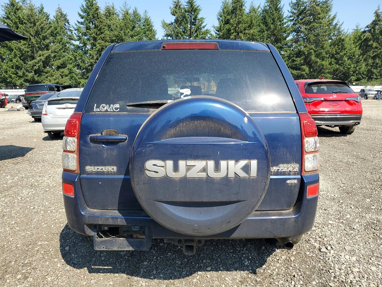 2010 Suzuki Grand Vitara Premium Blue vin: JS3TD0D29A4102499