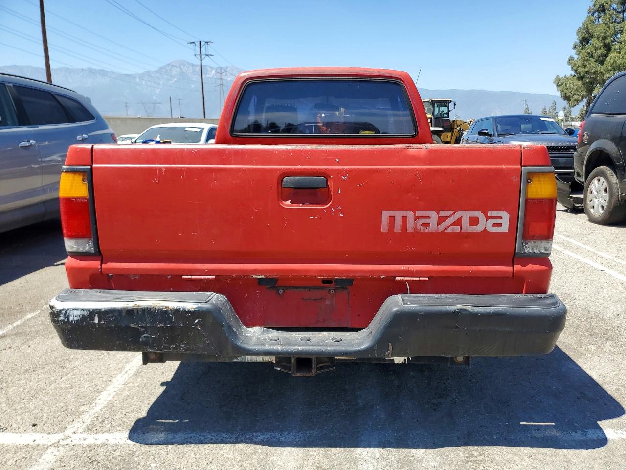 1991 Mazda B2600 Cab Plus Red vin: JM2UF3143M0116622