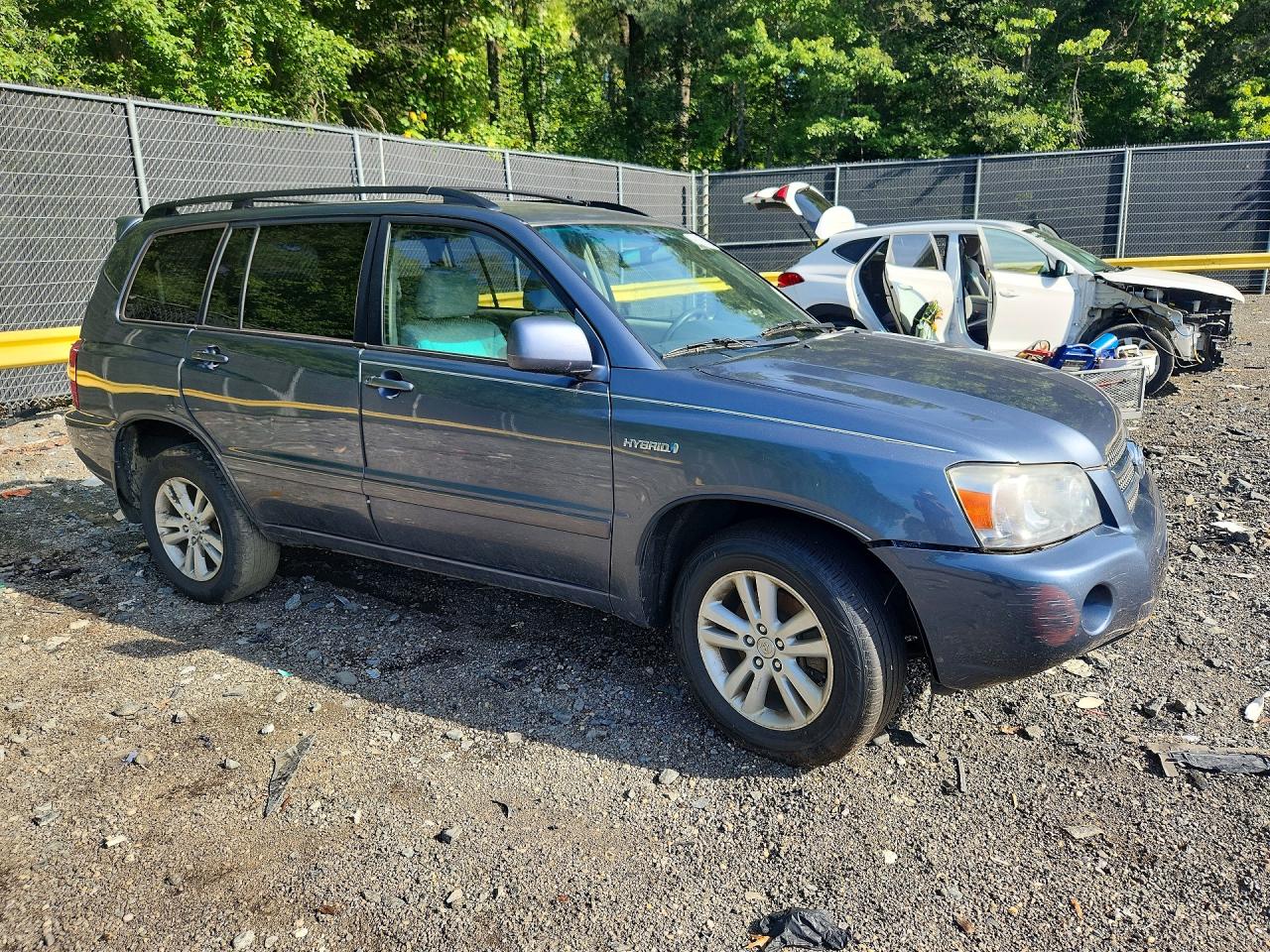 2006 Toyota Highlander Hybrid Blue vin: JTEEW21A560022782