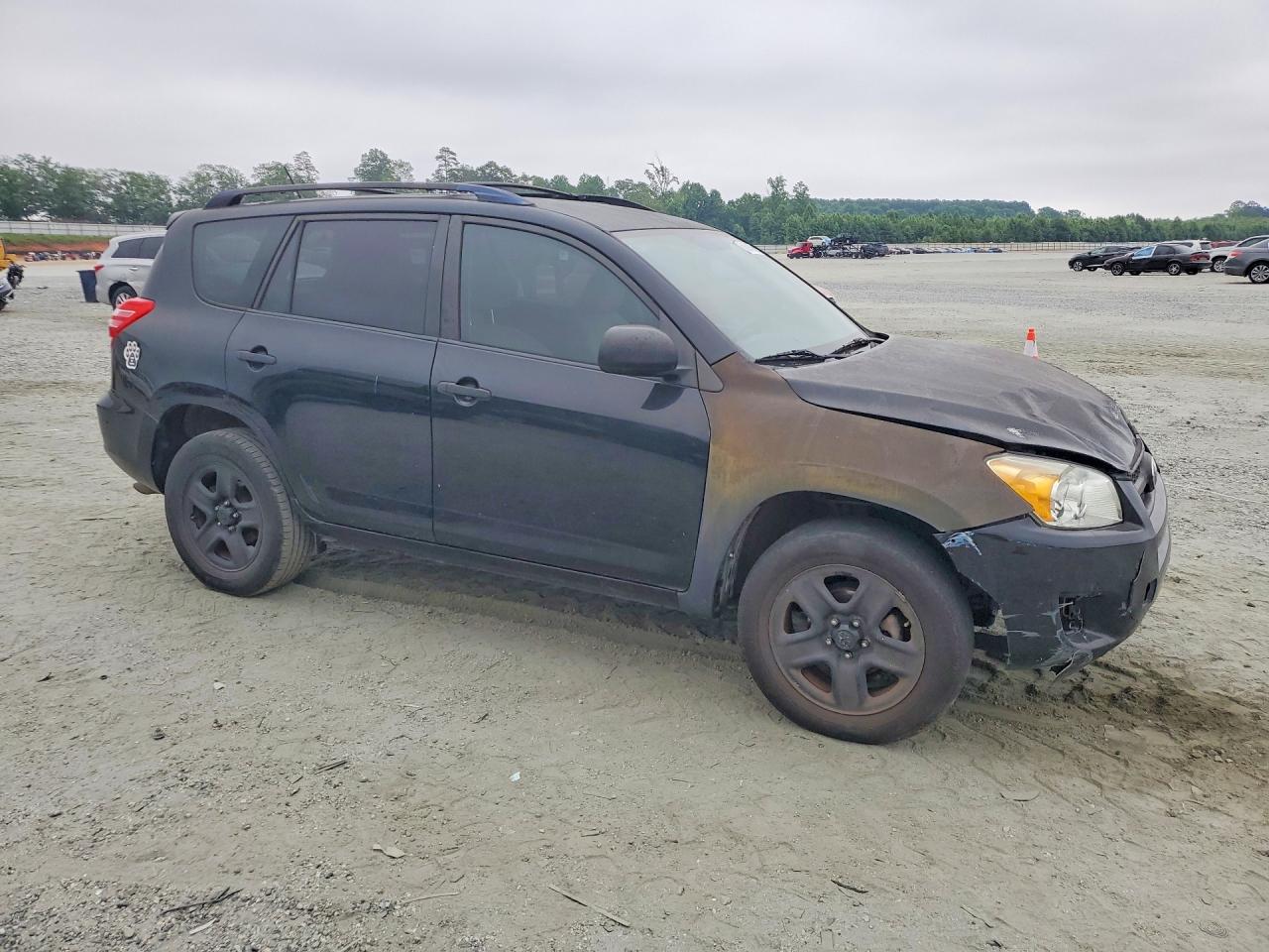 2009 Toyota Rav4 Base Black vin: JTMZF33V99D014614