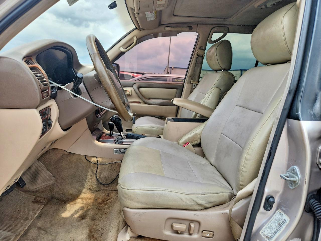 1999 Toyota Land Cruiser Base Gold vin: JT3HT05J5X0027141
