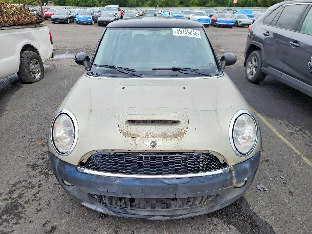 2007 Mini Cooper S Tan vin: WMWMF73517TV31343