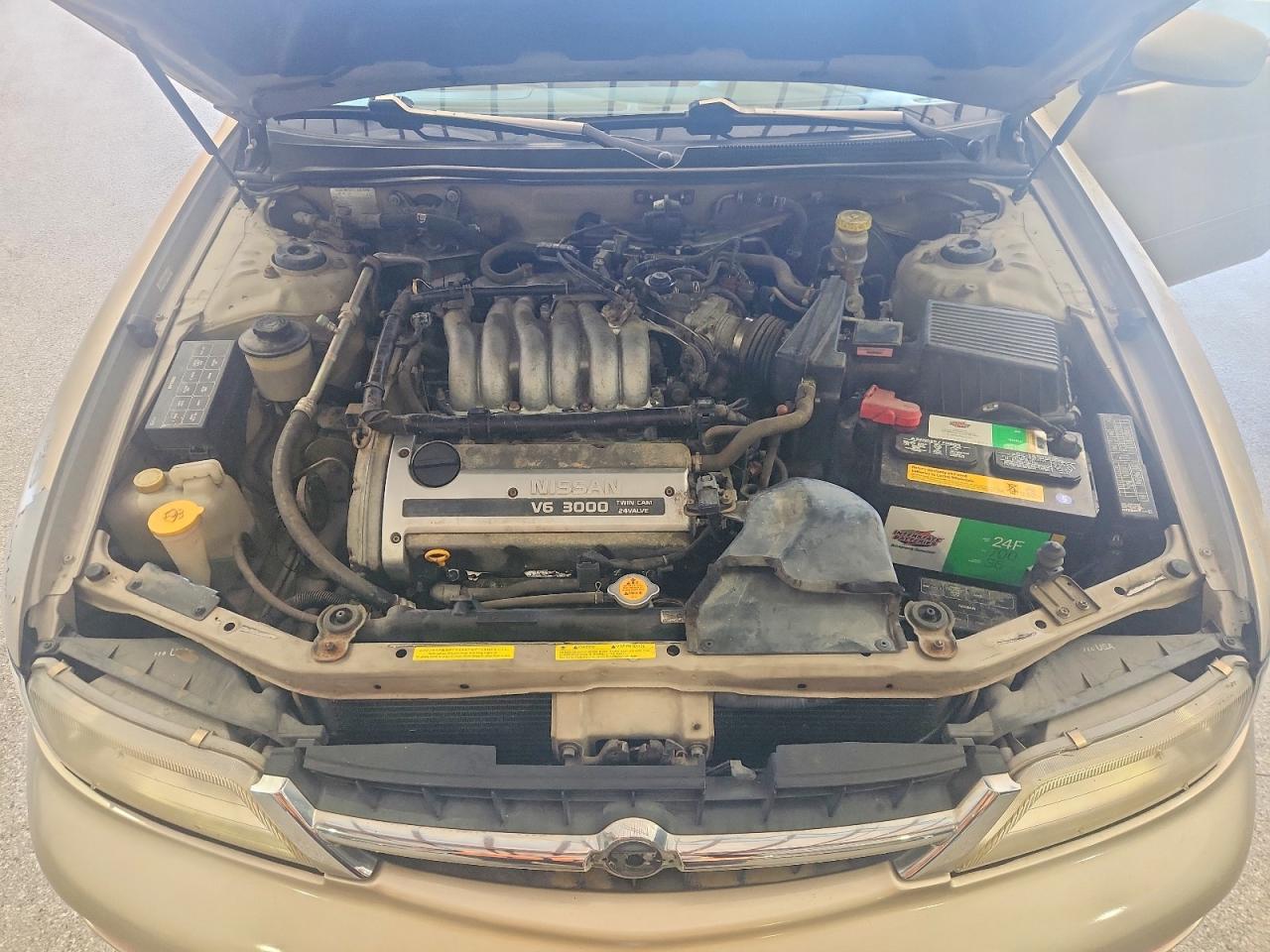1998 Nissan Maxima Gxe Tan vin: JN1CA21D3WM916456