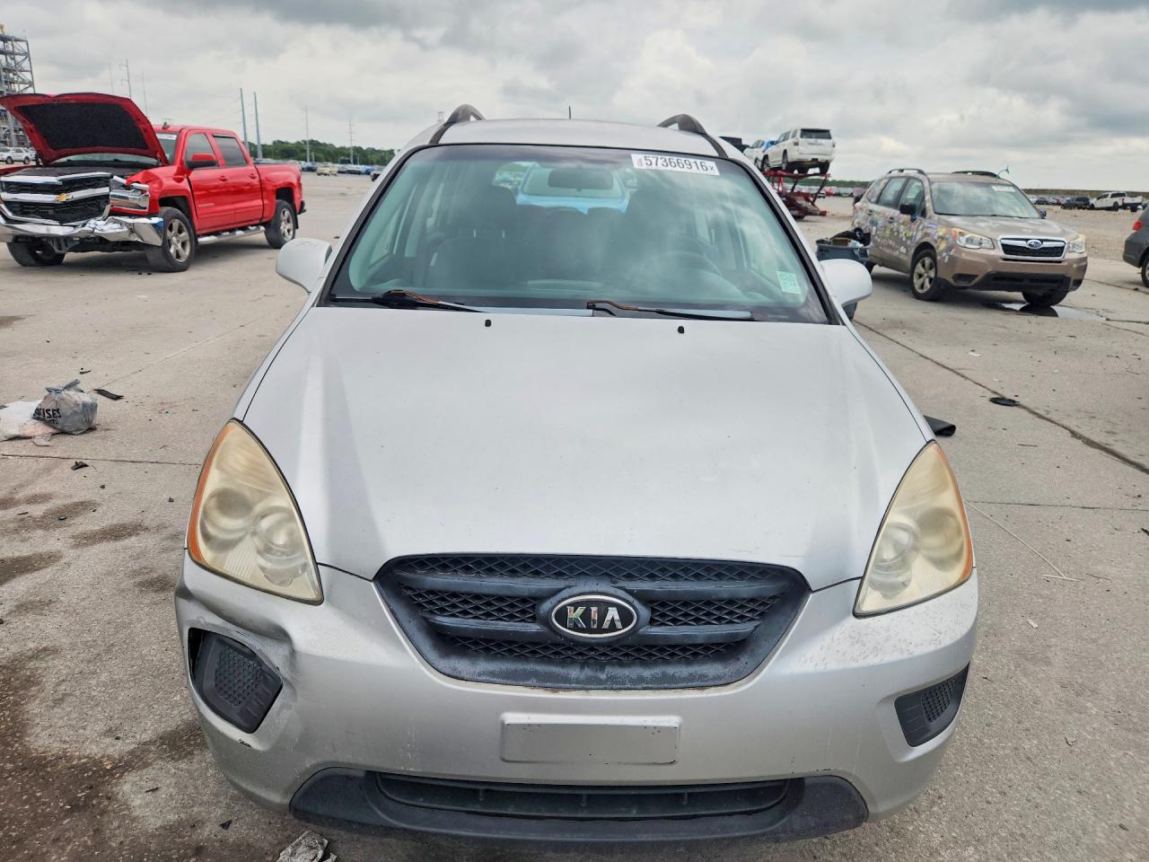 2009 Kia Rondo Base Серебряный vin: KNAFG528797271788