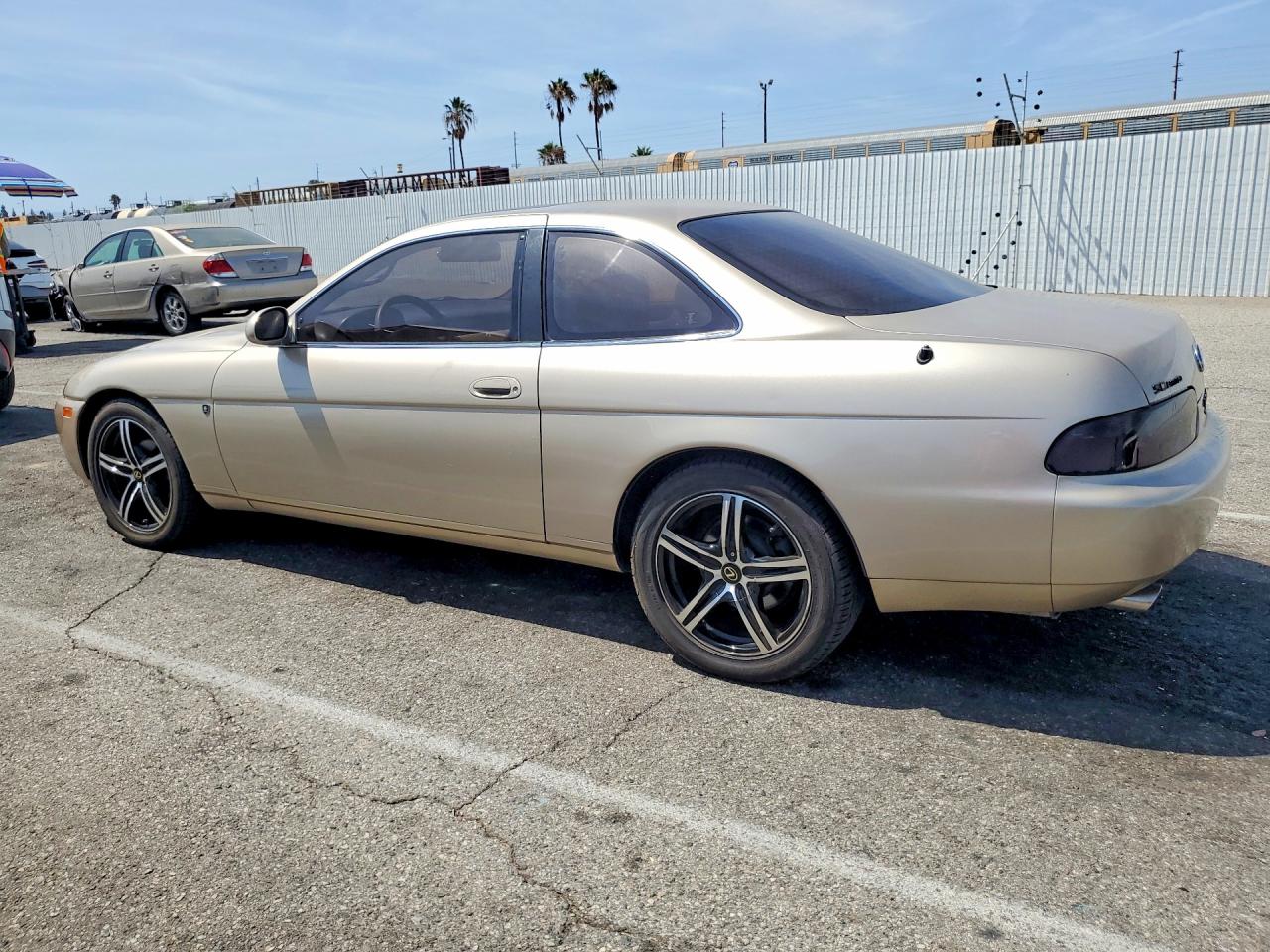 1996 Lexus Sc 300 Base Tan vin: JT8CD32ZXT0033654