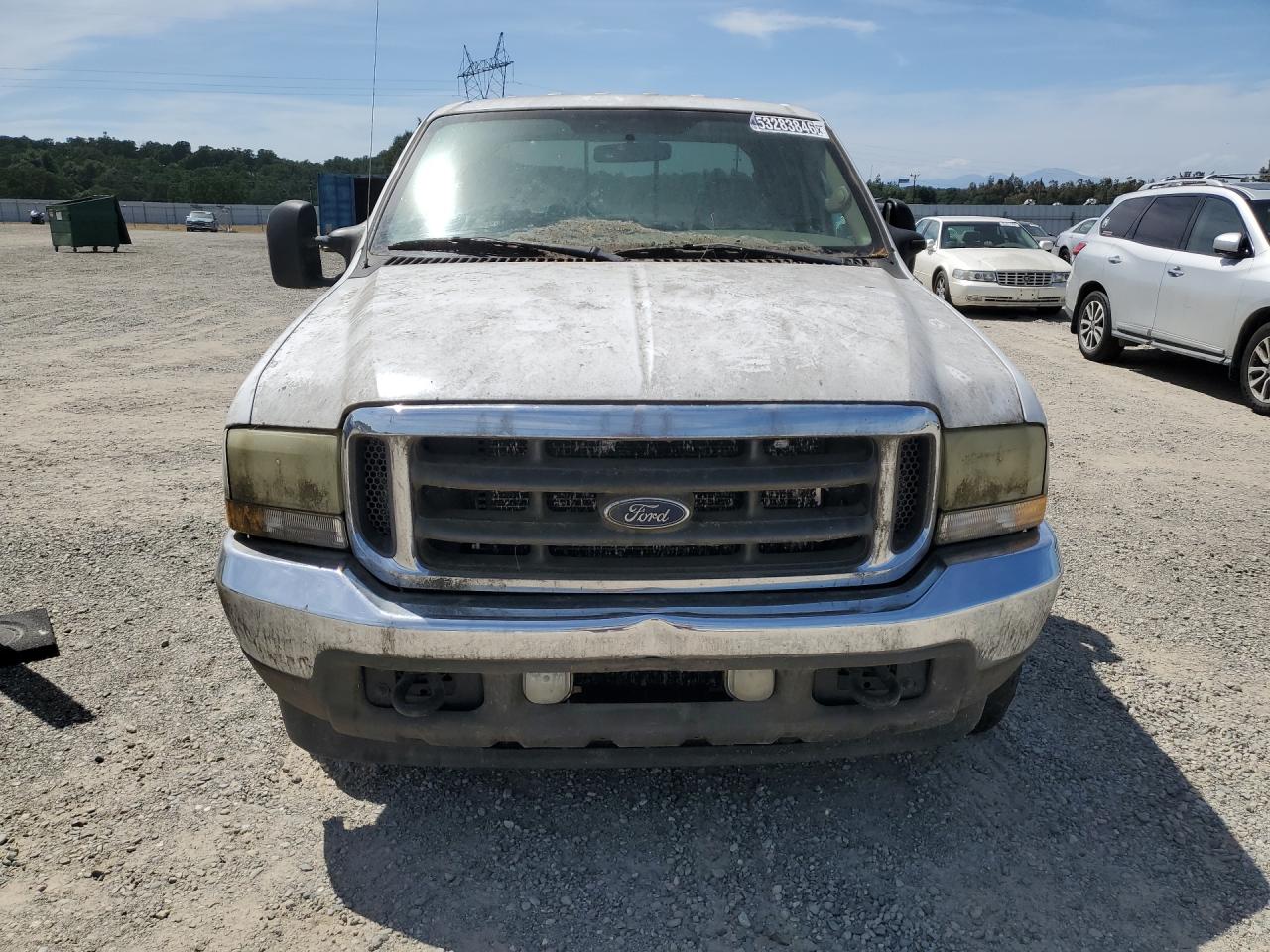 2004 Ford F250 Super Duty White vin: 1FTNW21P84EC11306 Damage: Left Head Lamp, Faded, Repair Required