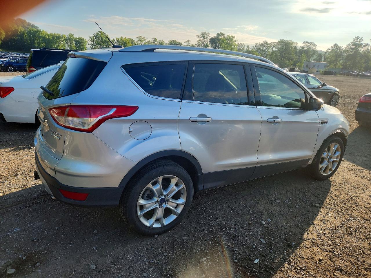 2014 Ford Escape Titanium Серебряный vin: 1FMCU0J97EUB56076