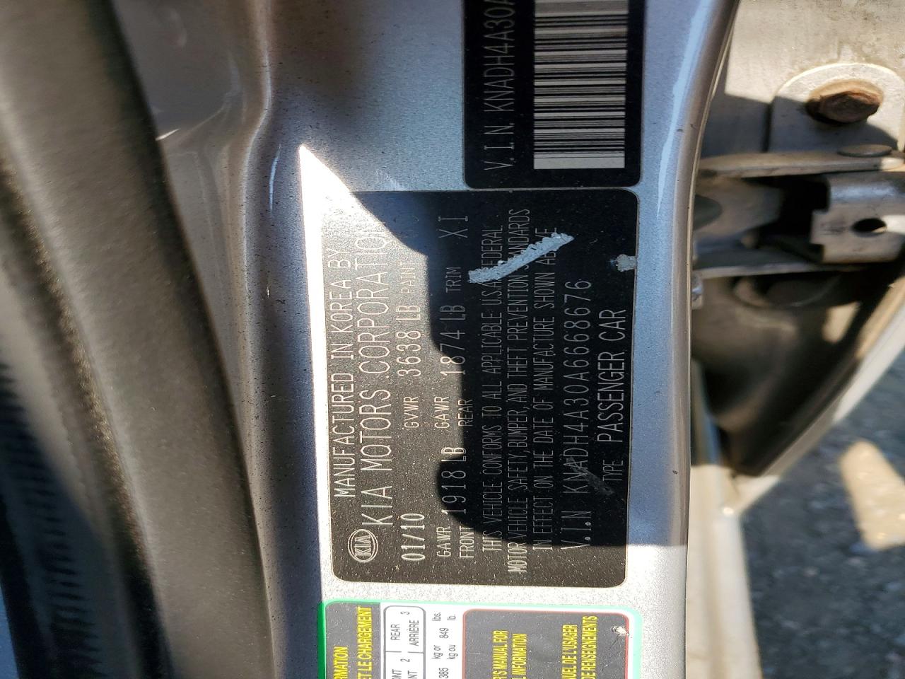 2010 Kia Rio Base Silver vin: KNADH4A30A6668676