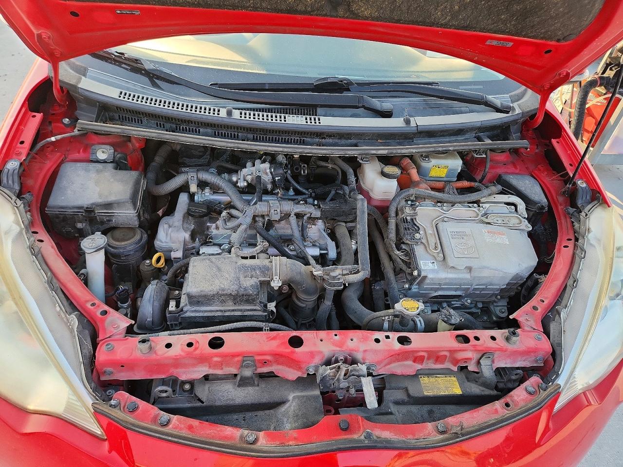 2012 Toyota Prius C Two Red vin: JTDKDTB31C1503220