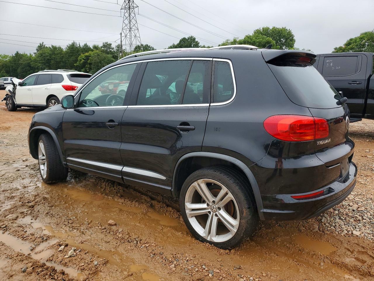 2015 Volkswagen Tiguan S Черный vin: WVGBV7AX0FW507349