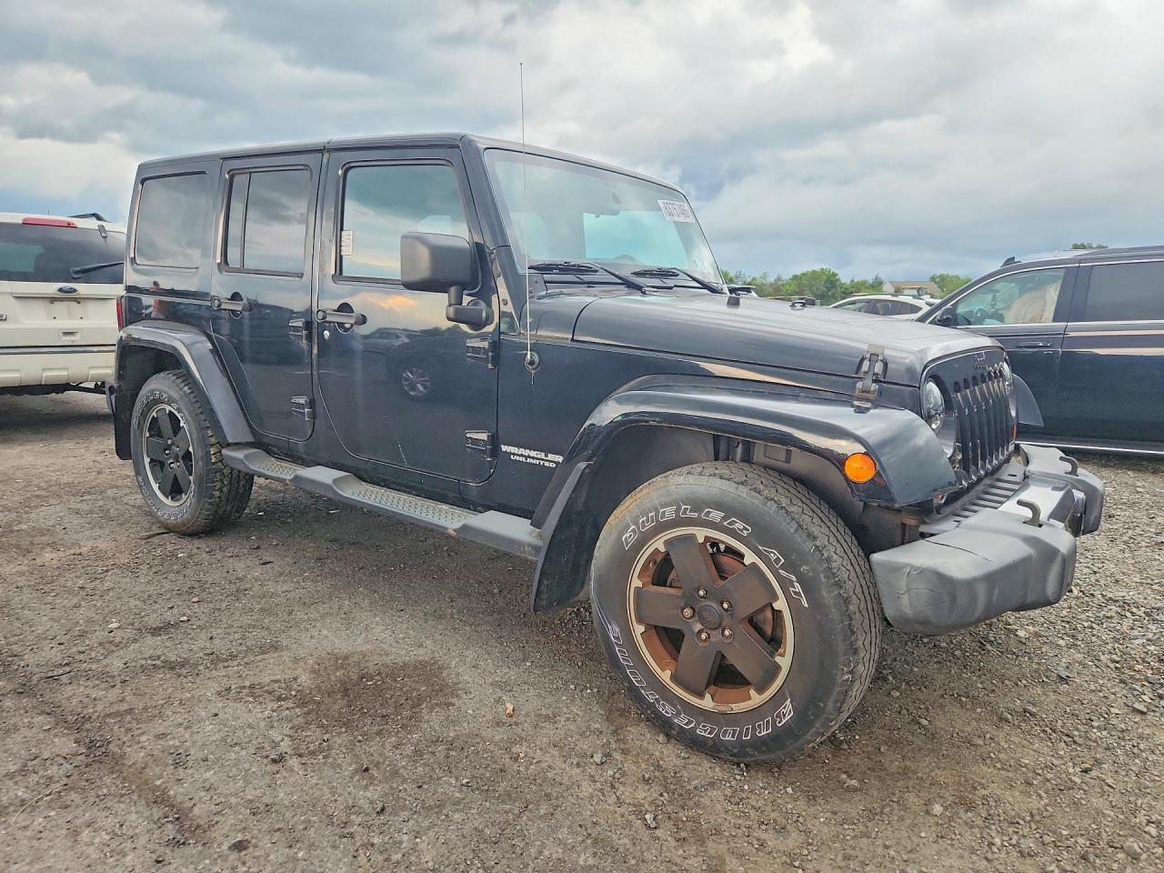 2012 Jeep Wrangler Unlimited Sahara Черный vin: 1C4BJWEG2CL254794