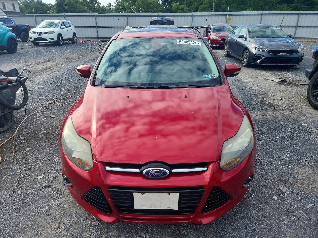 2012 Ford Focus Titanium Red vin: 1FAHP3N29CL308982