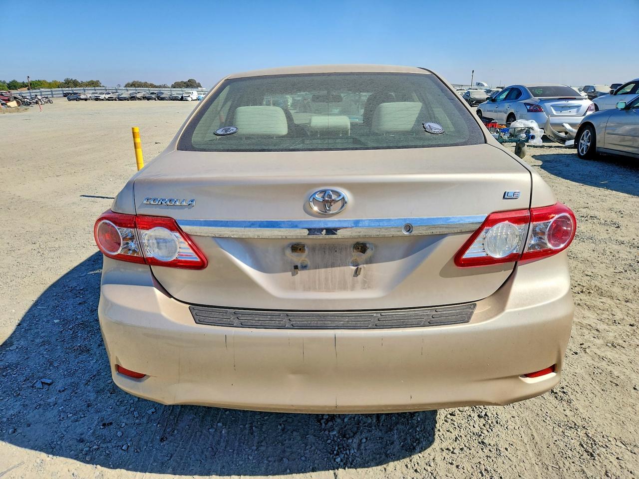 2011 Toyota Corolla Le Tan vin: JTDBU4EE4B9167372