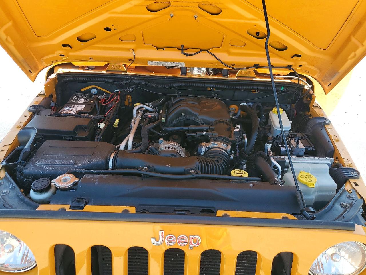 2012 Jeep Wrangler Sport Yellow vin: 1C4GJWAG6CL213998