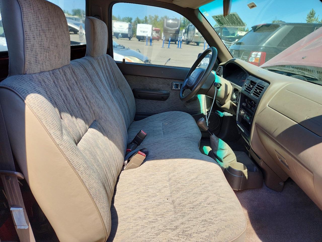1999 Toyota Tacoma Base Red vin: 4TANL42N5XZ557999